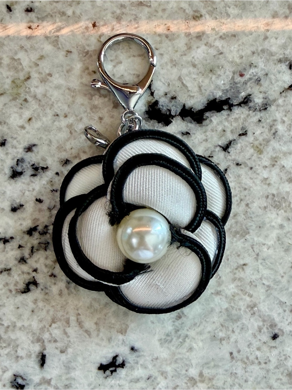 Black & White Camelia Flower Bag Charm with Silvertone Hardware
